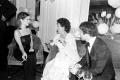 Carrie and Paul with a lady who seems to be Princess Margaret. It must be her because Paul and Carrie are a little stiff (she is a real princess after all) and it is well known that Margaret liked hanging out (but also drinking, taking drugs and f.cking)
