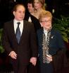 Paul with her mother holding her hand