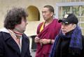 American singer Paul Simon, right, talks to his son Harper outside the residence of Tibetan spiritual leader the Dalai Lama in Dharamsala, India, Monday, Jan. 26, 2004. Simon met the Dalai Lama to interview him for a film that is part of a series on Nobel