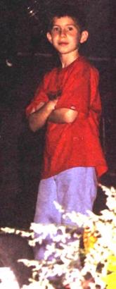 Adrian, Pauls first child with Edie Brickell.<br> This picture was taken on the summer tour 2002, where Adrian was with his dad for the first 5 concerts. He was sitting on stage always next to Steve Gadd's drum and playing percussion during 'Mrs. Ro