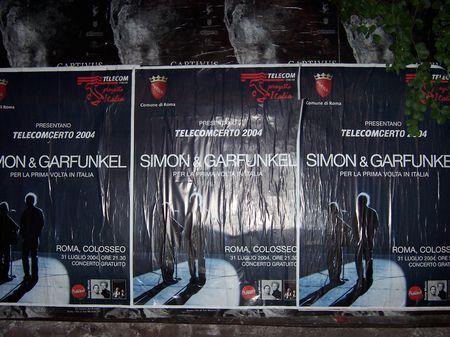 These three posters are bout 4.5 ft by 3.5 ft each and were posted on a billboard near the colosseum